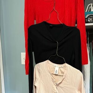 Red, Black, and Cream Long Sleeve Tops